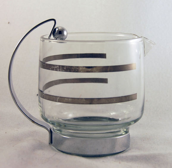 Unknown Creamer with Metal Holder