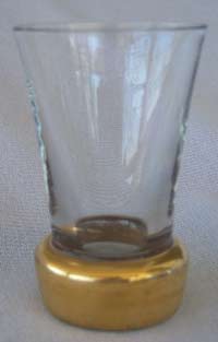 Unknown Tumbler with Gold Finished Weighted Base
