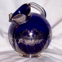Unknown Silver Overlay Decoration on Cambridge Jug